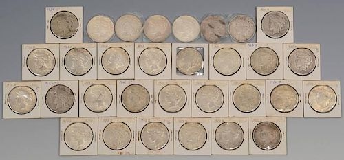 GROUP OF 31 SILVER PEACE DOLLARS,