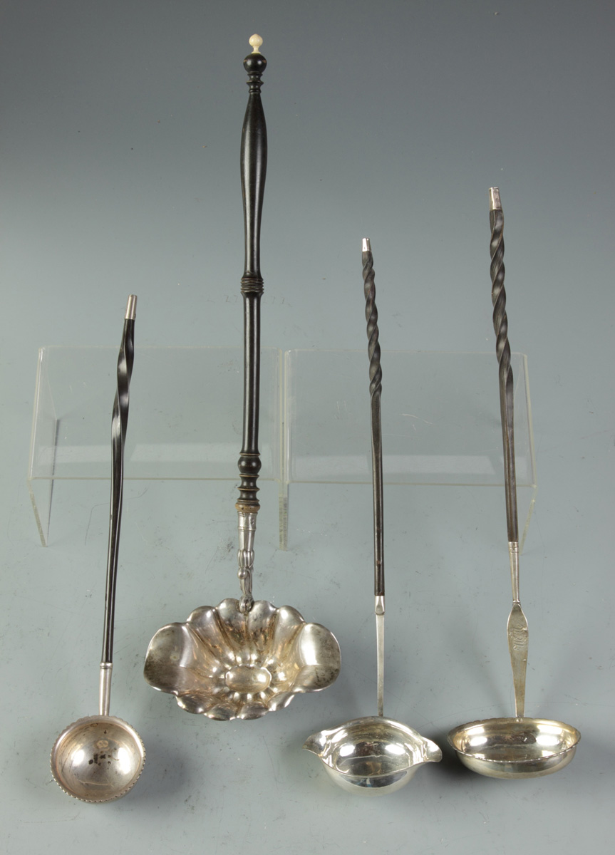 Group of 4 Hot Toddy Spoons 181.