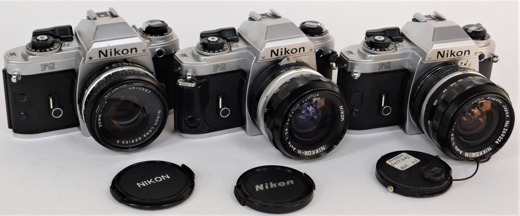 GROUP OF 4 NIKON FG SLR CAMERAS