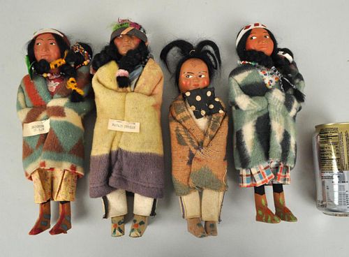 GROUP OF 4 "SKOOKUM" NATIVE
