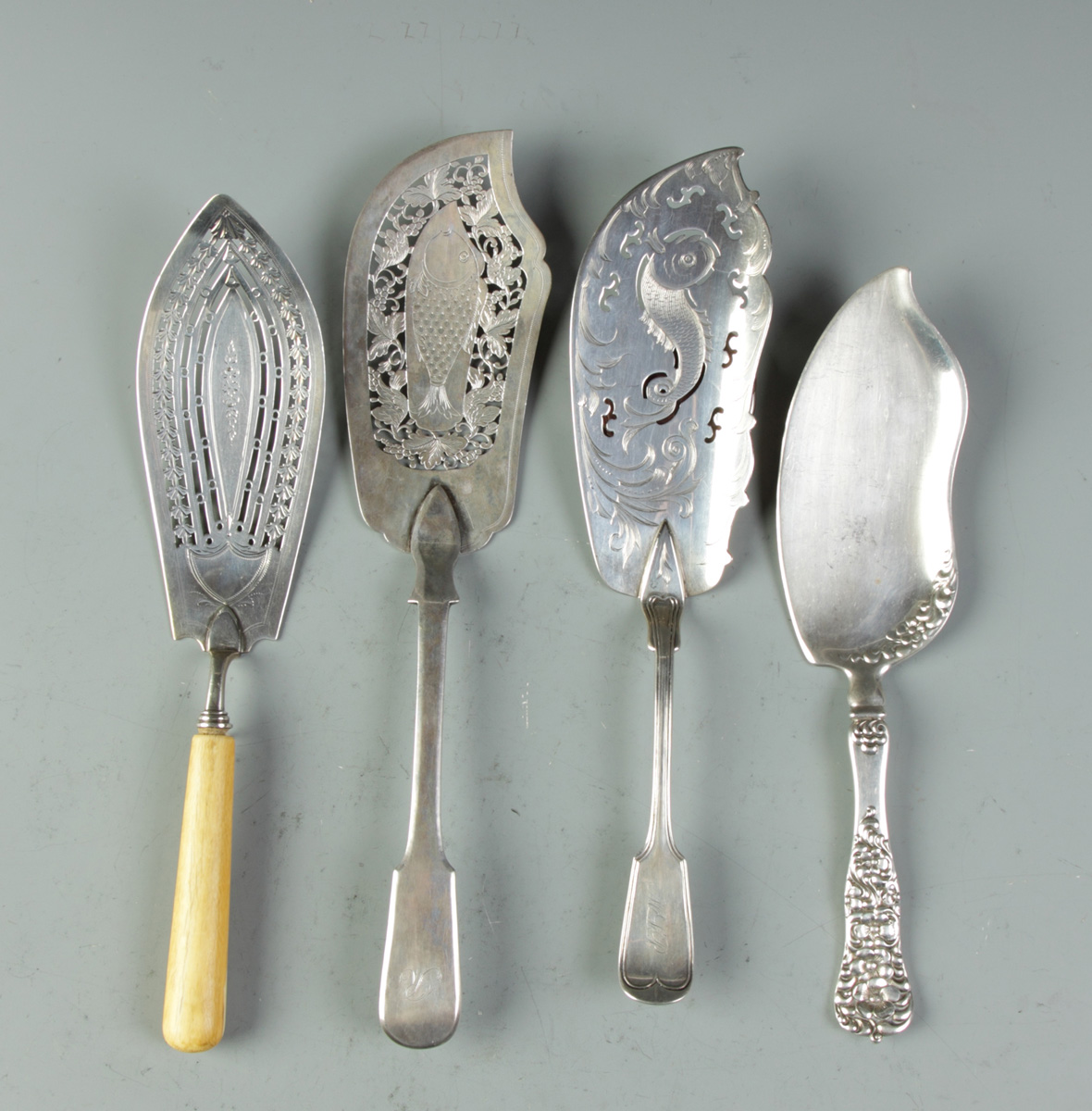 Group of 4 Sterling Fish Slices 74.