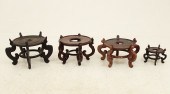 GROUP OF 4 TEAKWOOD STANDS GRO