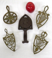 GROUP OF 5 EARLY TRIVETS IN BR