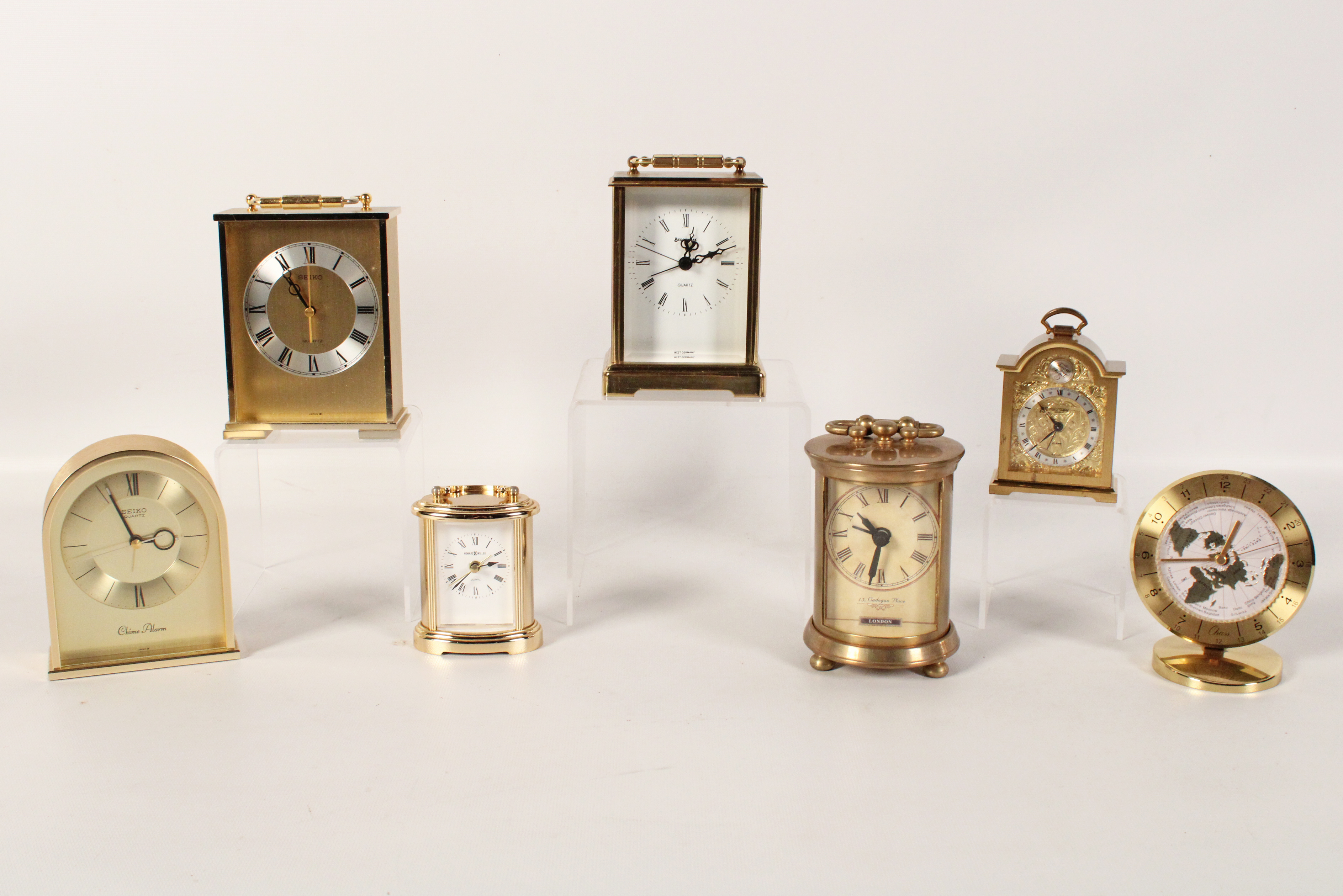 GROUP OF 7 BRASS TABLE CLOCKS