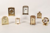 GROUP OF 7 BRASS TABLE CLOCKS