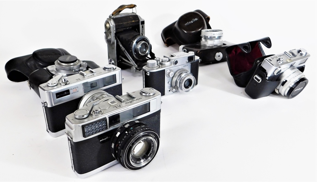 GROUP OF 7 MINOLTA 35MM CAMERAS