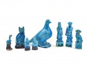 GROUP OF 8 PEACOCK GLAZED FIGU