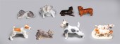 Group of 8 porcelain dog figur