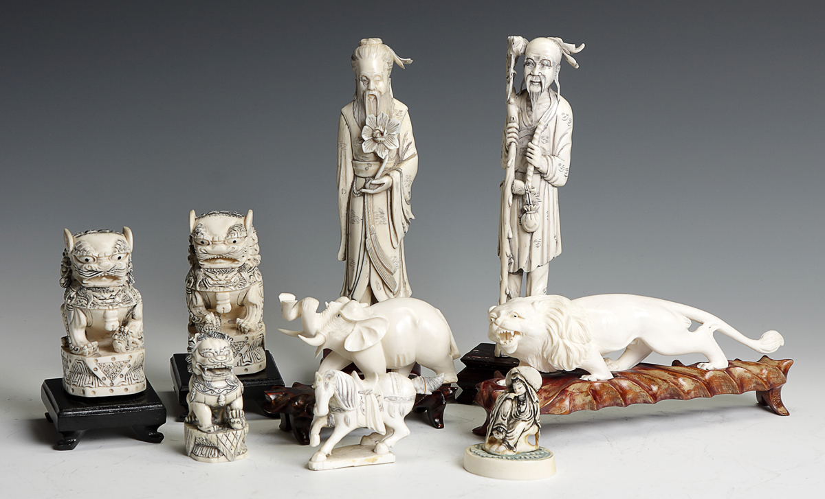 Group of 9 Carved Ivory Figures &