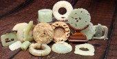 GROUP OF ASIAN CARVED STONE DI