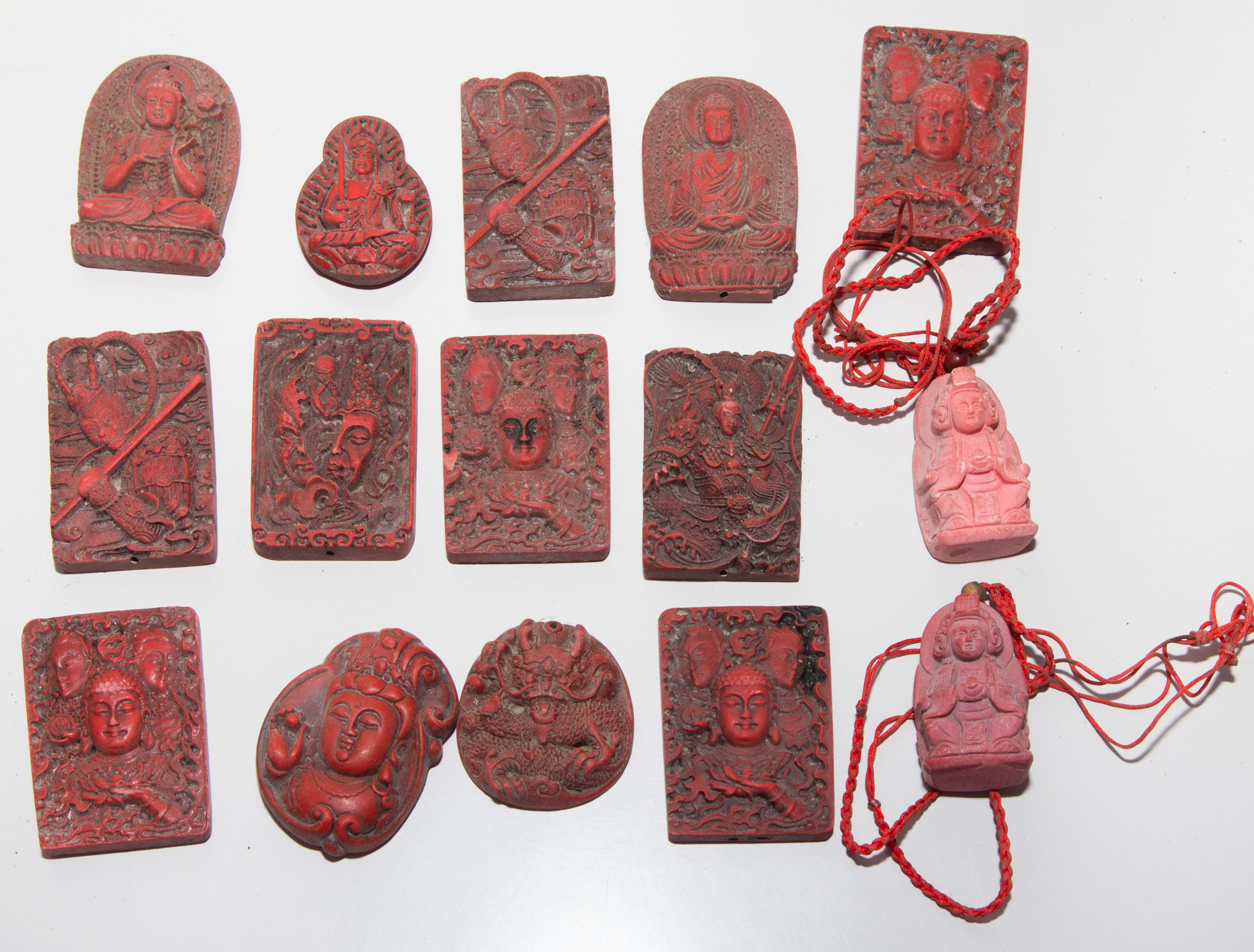 GROUP OF ASIAN STYLE PENDANTS .