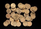 GROUP OF BRASS HEADS-TAILS TOK