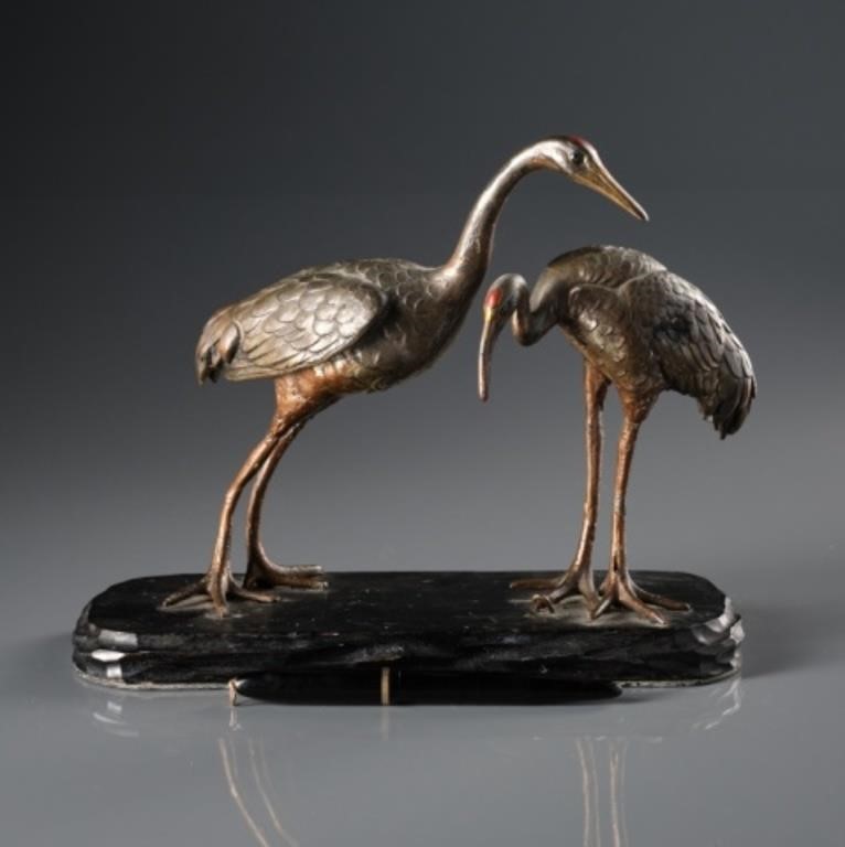 GROUP OF BRONZE CRANESA couple of