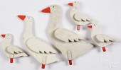 GROUP OF CARVED AND PAINTED DU