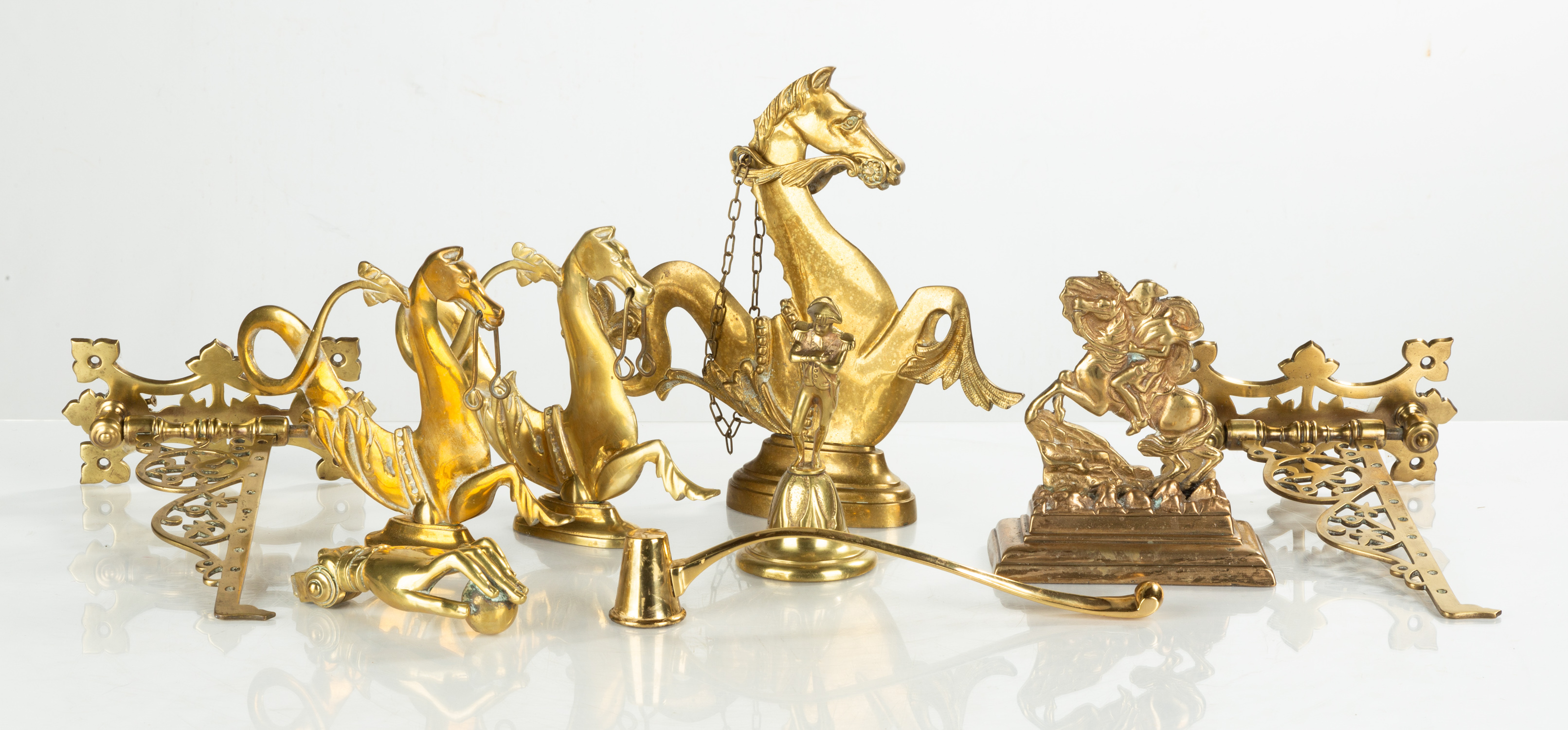 GROUP OF CAST BRASS ORNAMENTS