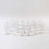 GROUP OF COLORLESS GLASS STEMW