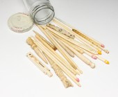 GROUP OF CROCHET NEEDLES AND A