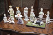 GROUP OF CYBIS FIGURES.  Ameri