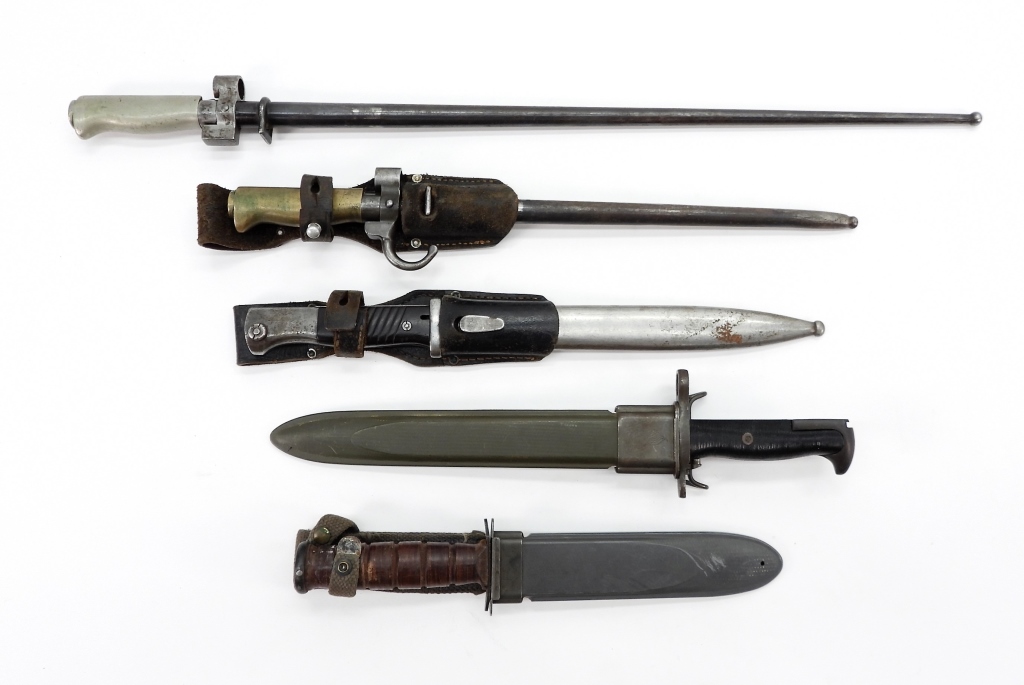 GROUP OF EDGED WEAPONS A USN Mark