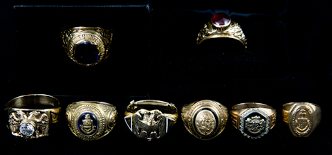 GROUP OF EIGHT GOLD CLASS RINGS