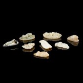GROUP OF EIGHT JADE PENDANTS ?