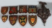 GROUP OF EIGHT PAINTED ARMORIA