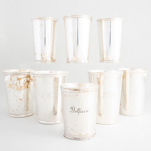GROUP OF EIGHT SILVER BEAKER