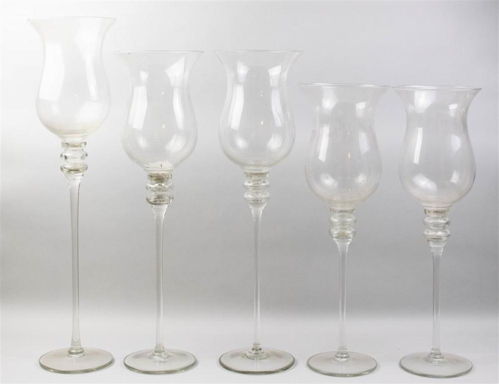 GROUP OF FIVE CANDLESTICKS WITH