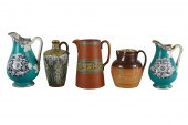 GROUP OF FIVE CERAMIC PITCHERS