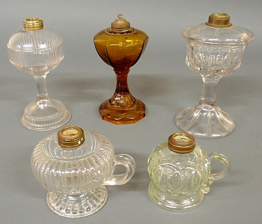 Group of five oil lamps tallest
