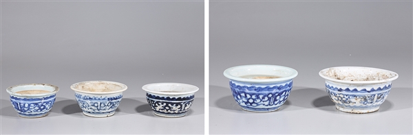 Group of five old blue and white