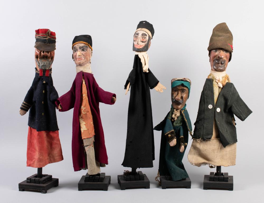 GROUP OF FIVE PUPPETS WITH CARVED