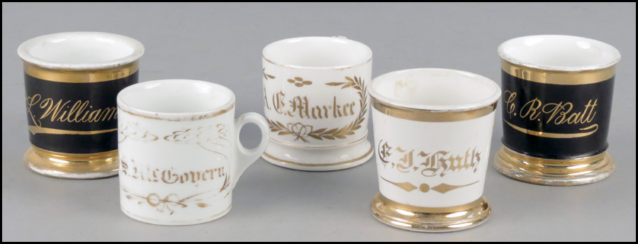 GROUP OF FIVE SHAVING MUGS.