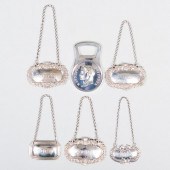 GROUP OF FIVE SILVER BOTTLE TI