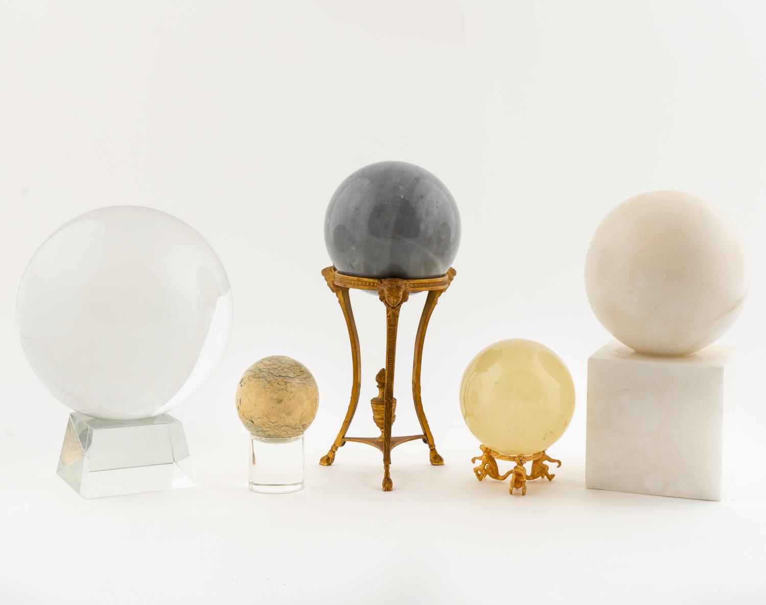 GROUP OF FIVE STONE AND MARBLE ORBS