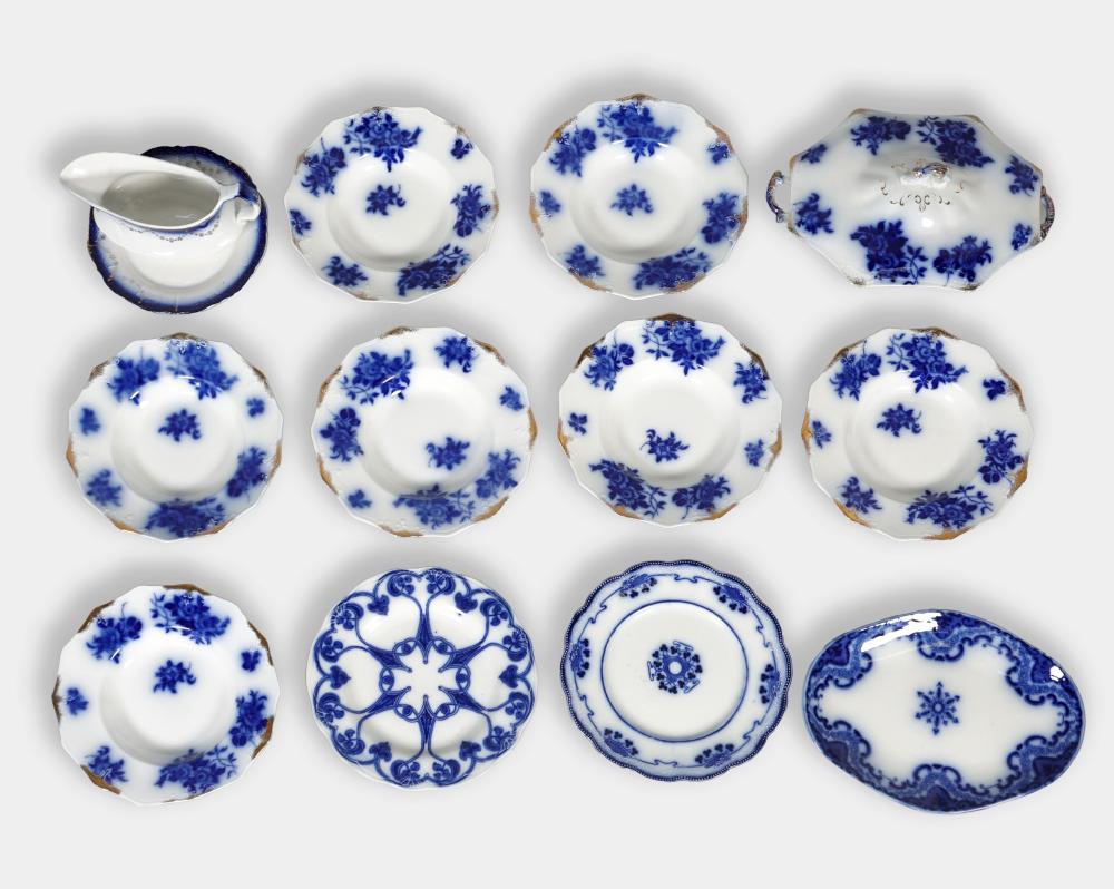 GROUP OF FLOW BLUE PLATES AND