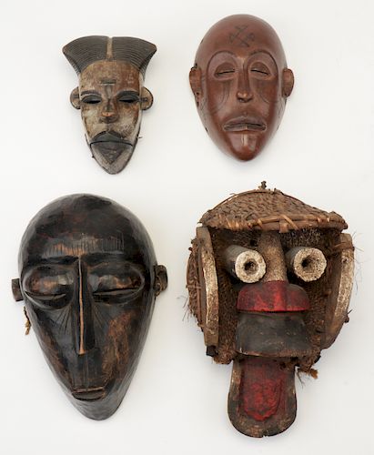 GROUP OF FOUR AFRICAN MASKSGroup of