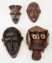 GROUP OF FOUR AFRICAN MASKSGro