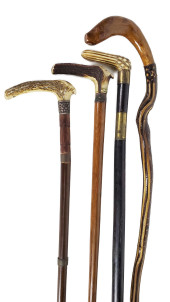 GROUP OF FOUR ANTIQUE CANES TO