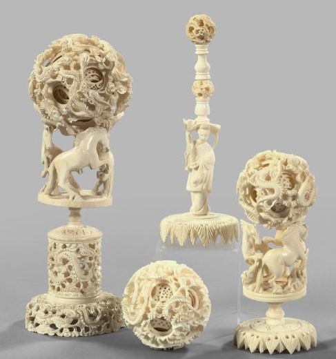 Group of Four Carved Bone Spheres,