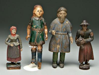 Group of four carved wood