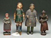 Group of four carved wood figu