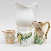 GROUP OF FOUR CERAMIC PITCHERS