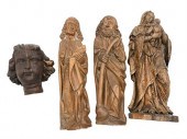 GROUP OF FOUR EARLY CARVED WOO