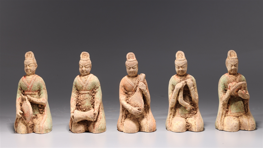 Group of four early style ceramic