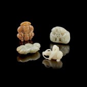 GROUP OF FOUR 'FIGURAL' JADE C