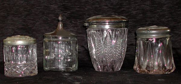 Group of Four Glass Jars with