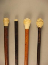Group of four ivory mounted wa