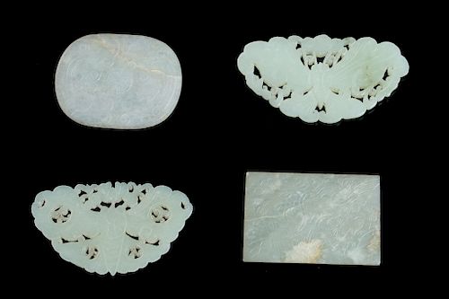 GROUP OF FOUR JADE PENDANTSA set of