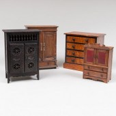 GROUP OF FOUR MINIATURE SALESM